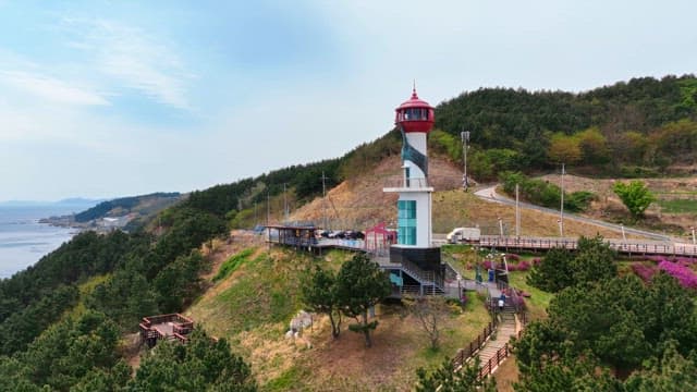 Lighthouse on a coastal hill