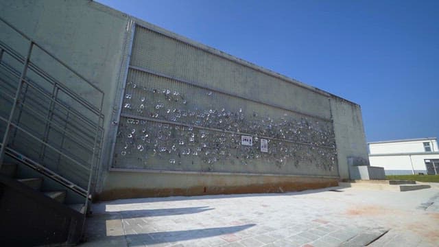 Wall with Handcuffs on Display