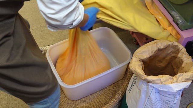 Flour poured into a plastic container