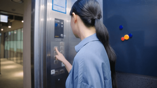 Woman riding an elevator