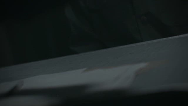 Man Being Scolded in a Dark Room