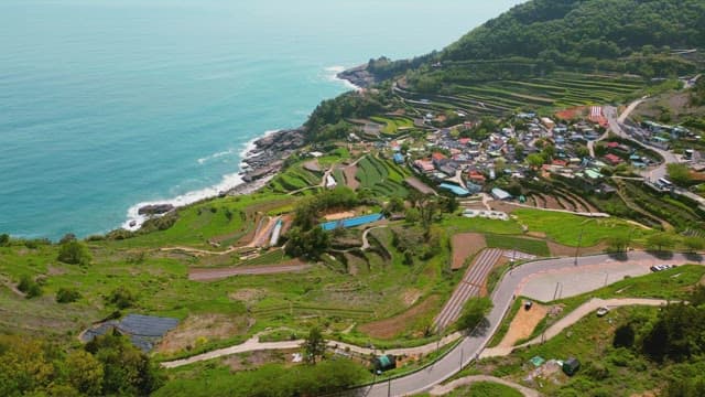 Coastal village with terraced fields