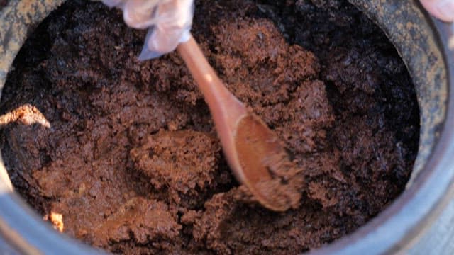 Aged soybean paste taken out of a crock pot