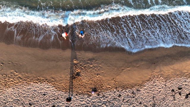 People having fun at a sandy beach