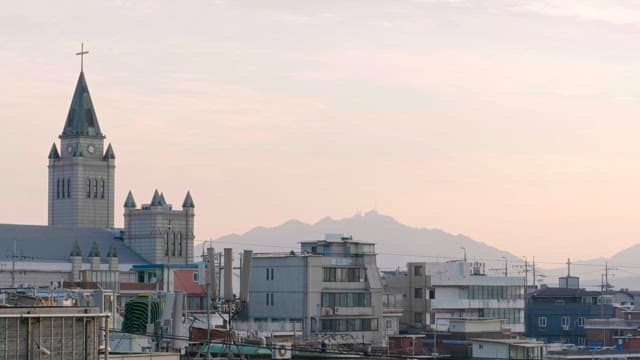 Dusk illuminating the church and buildings