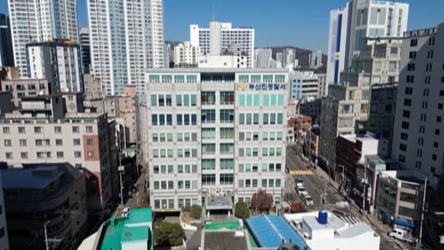 Exterior of a Police Station in a City with Dense Buildings