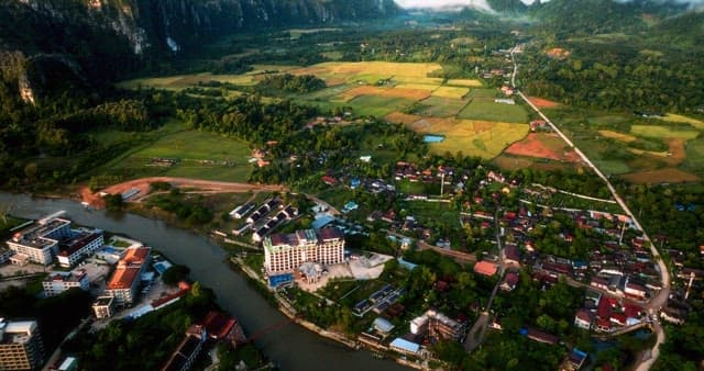 Aerial View of Lush Countryside and Mountains