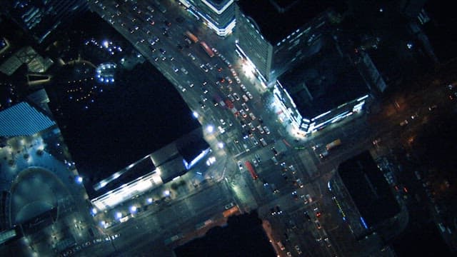 Night view of a busy city intersection