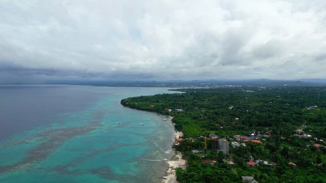 Coastal village landscape with lush greenery