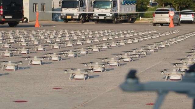 Fleet of Drones Prepared for Takeoff and Flight