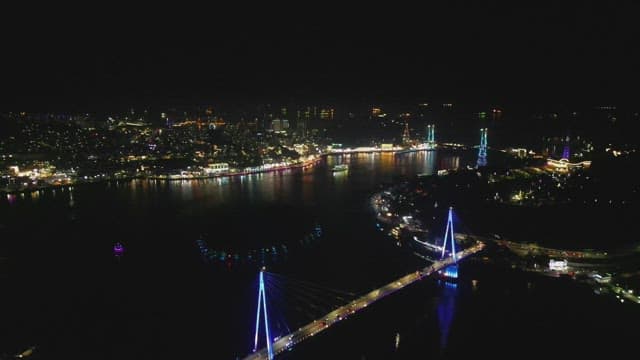 Night view of a city with illuminated bridges