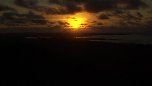 Sunset Over a Serene Coastal Landscape