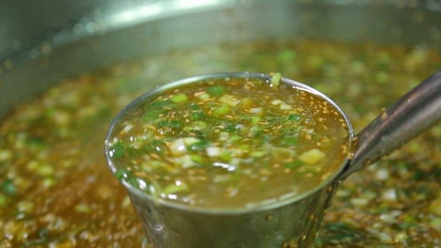 Marinating meat with a flavorful sauce