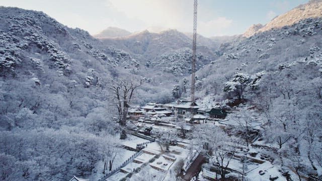 Snow-covered traditional Korean temple