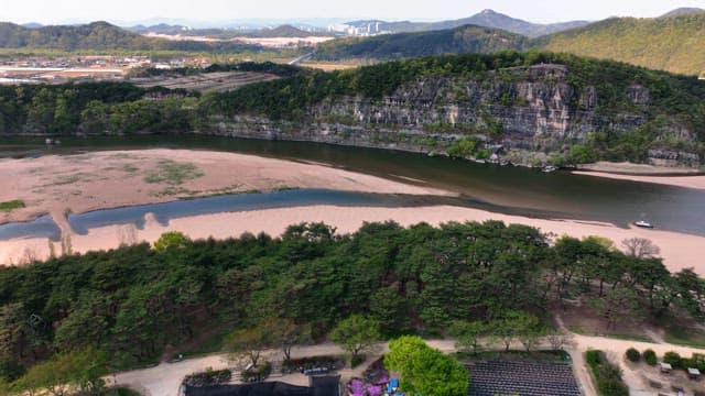 Scenic river with surrounding cliffs