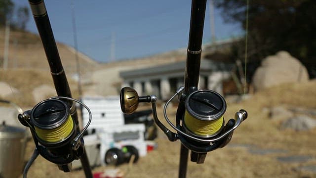Fishing rods set up near a small building