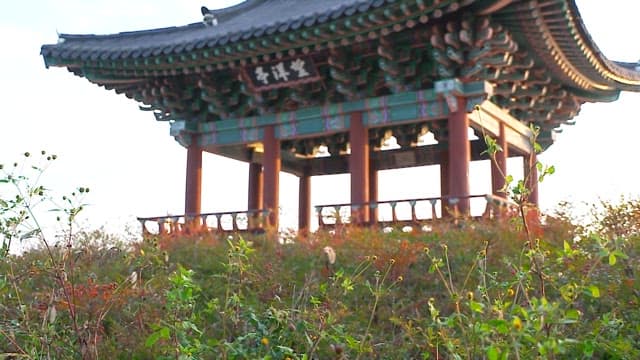 Traditional Korean pavilion on a hill