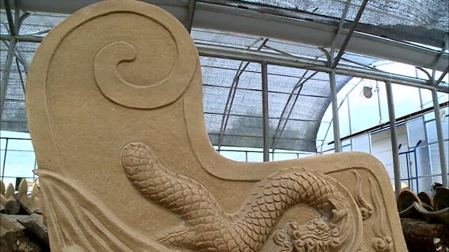 Elaborate sculpture depicting a dragon made of clay