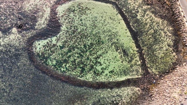 Heart-shaped rock formation by the sea