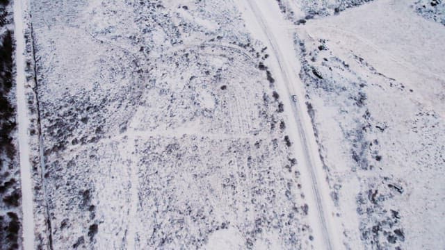 Car driving on a snowy road