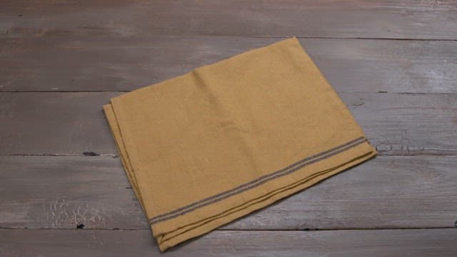 Sliced smoked duck on a white plate