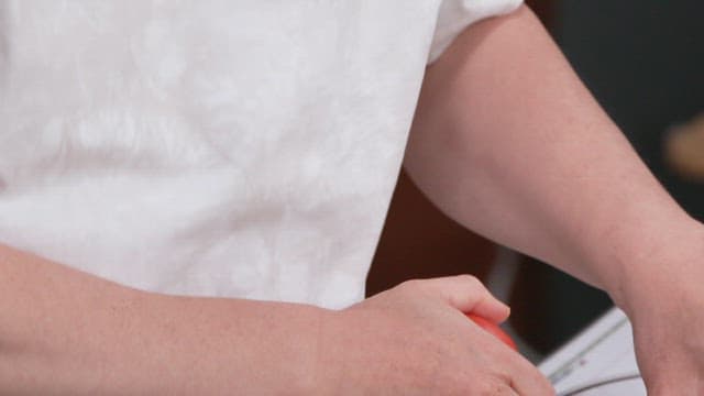 Man Showing Tomatoes in a Glass Bowl