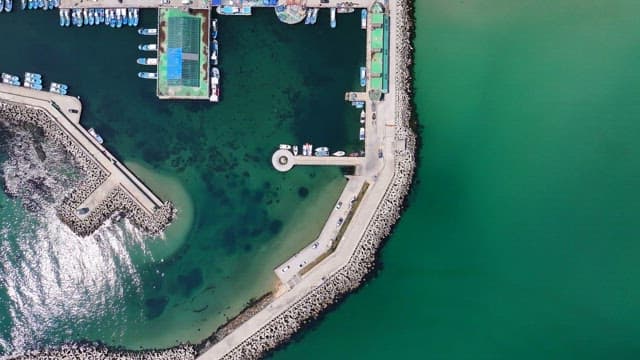 View of a coastal harbor with boats