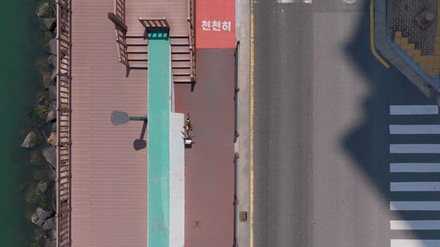 Peaceful riverside promenade and a traffic-carrying road