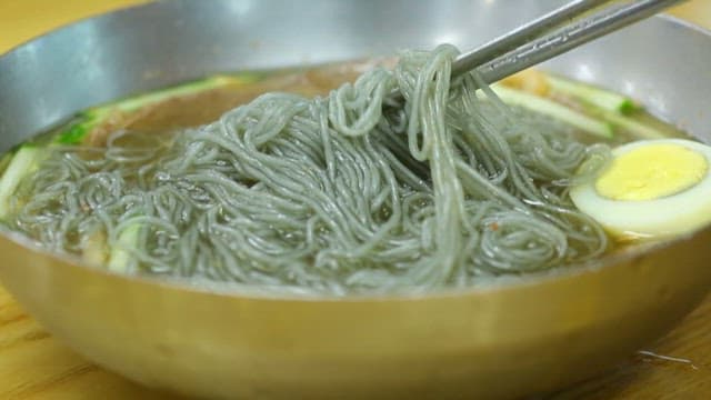 Cool summer treat, a chopstickful of naengmyeon