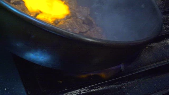 Beef grilled with gas fire and torch