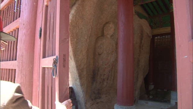 Buddhist Stone Carving in Temple Entrance