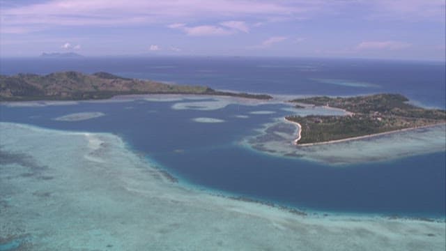 Tropical island surrounded by the sea