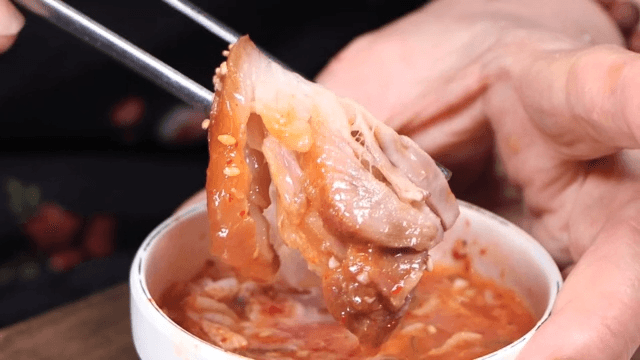 Delicious piece of pig's feet dipped in salted shrimp