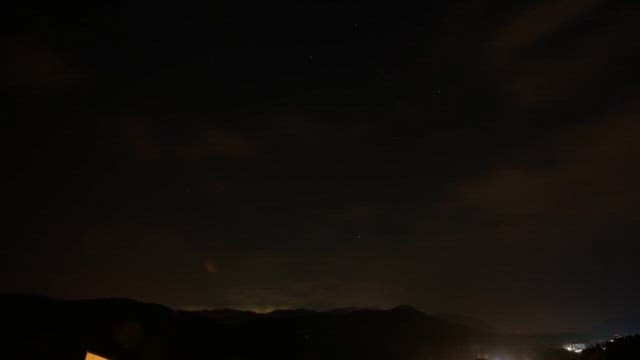 Sky changing in mountainous areas from night to morning