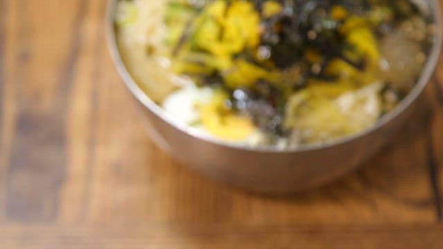 Appetizing cold udon served with toppings