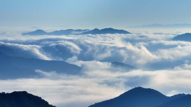 Mountains covered in clouds