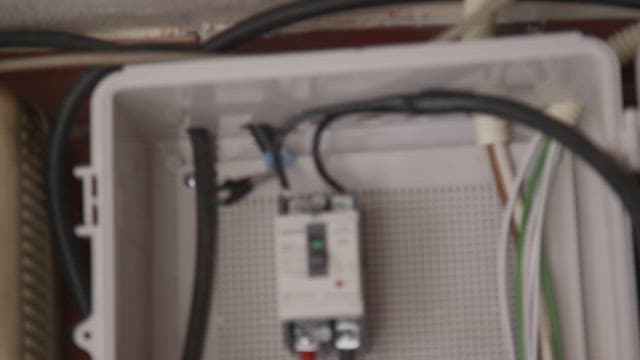 Inspection of an electrical circuit breaker inside a box