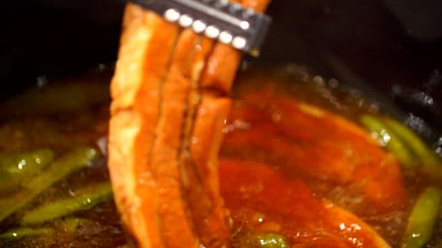 Appetizing boiled pork pulled from the broth