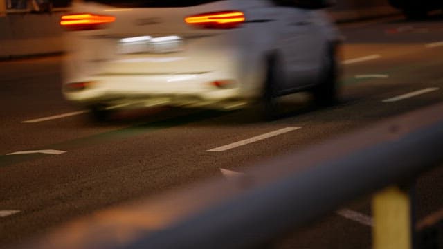 Cars driving on Yanghwa bridge at night