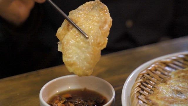 Fried Korean Pancakes Dipped in Soy Sauce