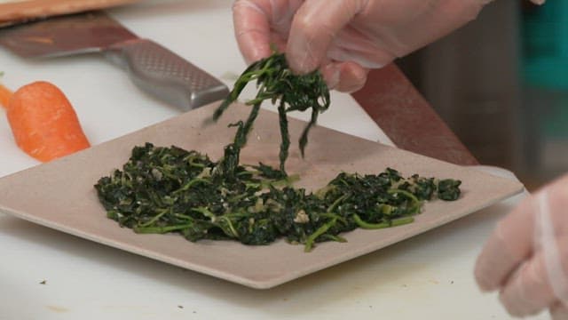Preparing kimbap with perilla leaves