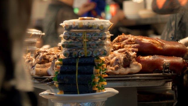 Korean street food stall with gimbap and braised pigs' feet
