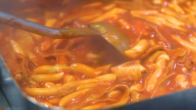 Stirring Spicy Korean Tteokbokki Dish
