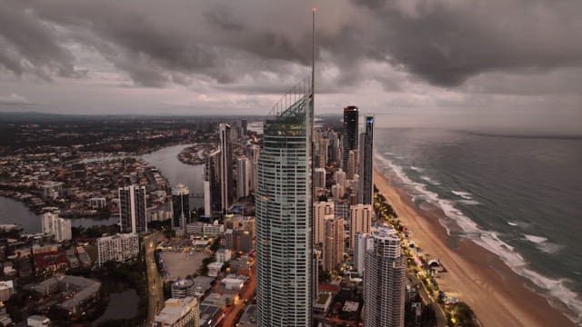 Coastal Cityscape with Skyscrapers and Beach