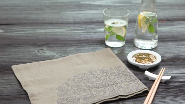 Table with Korean Thistle Pancake on White Plate