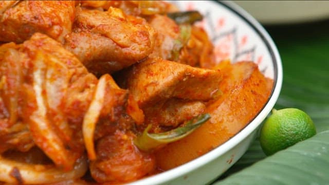 Appetizing braised spicy chicken in a bowl