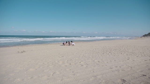 Family enjoying a peaceful beach day
