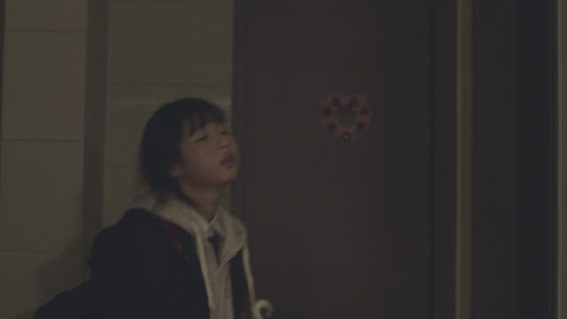 Tired student returning home in the evening