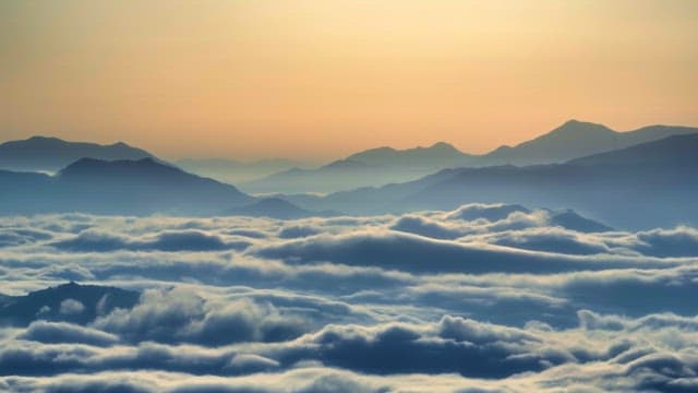Mountains and clouds at sunrise