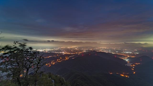 Overlooking Dusk City Lights from Mountain